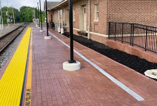 Train Station Exterior higlighting brick pavement.