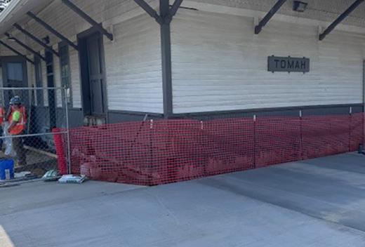 Station exterior. New concrete platform.