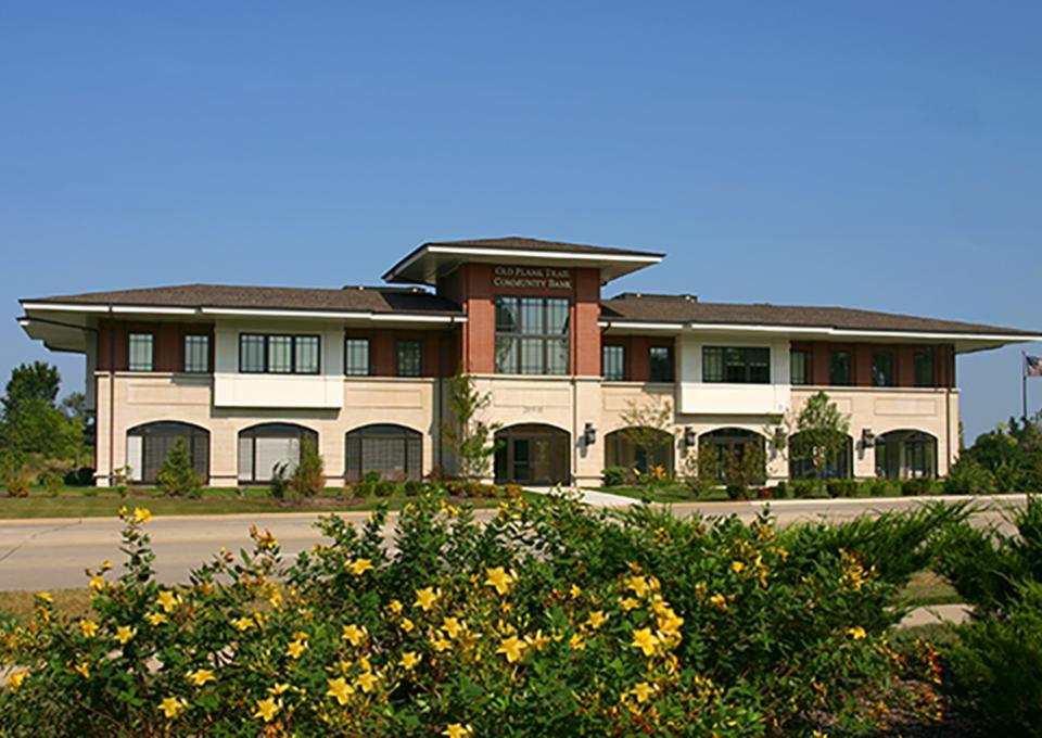 Bank exterior made of red brick and prefabricated concrete forms