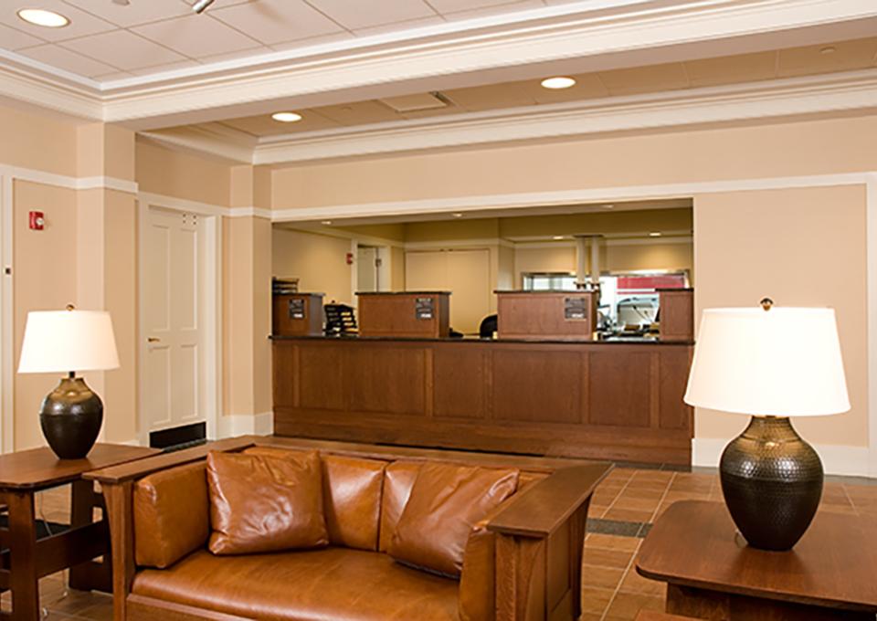 Bank interior waiting room with leather coaches.