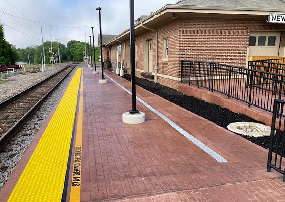 Train Station Exterior higlighting brick pavement.